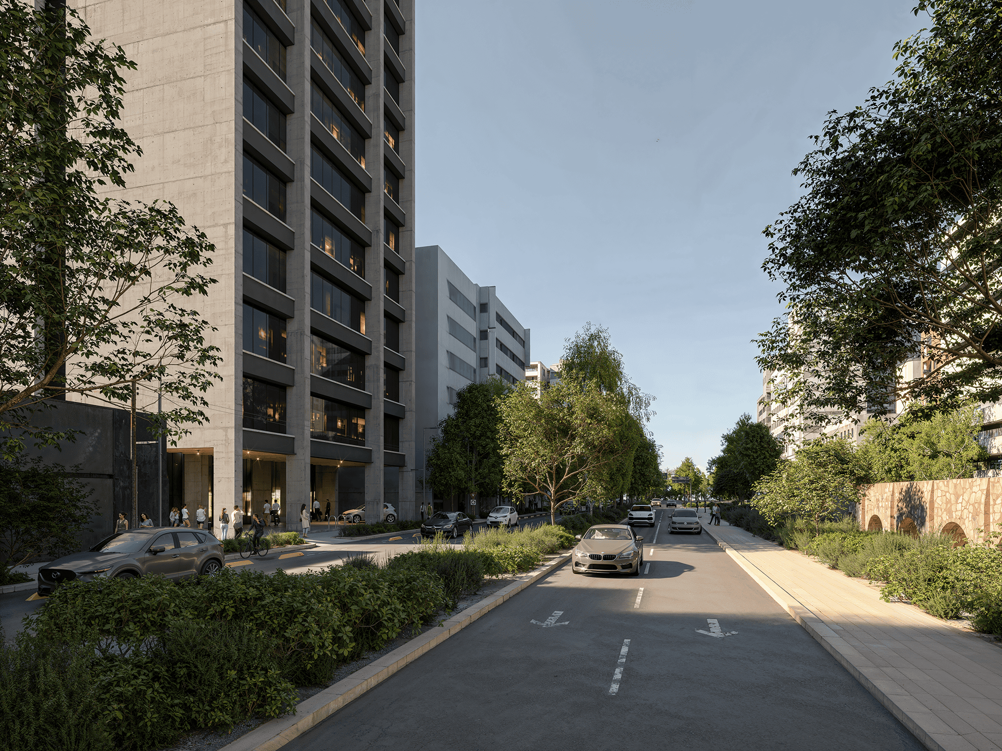 Street with a view to Gran Ciudad Roma Norte building. Promenade with trees.